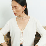 WHITE PEARL SWIRL CHARM NECKLACE
