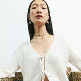 WHITE PEARL SWIRL CHARM NECKLACE