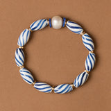 WHITE LAPIS SINGLE STRAND BEAD BRACELET