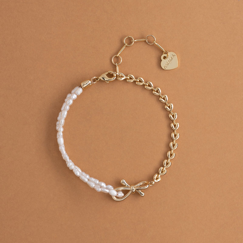 ASSYMETRICAL WHITE PEARL GOLD CHAIN BRACELET