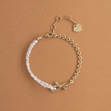 ASSYMETRICAL WHITE PEARL GOLD CHAIN BRACELET