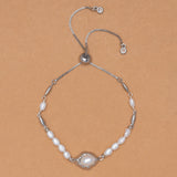 WHITE PEARL RHODIUM PULL BALL BRACELET