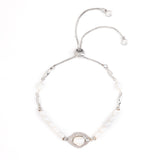 WHITE PEARL RHODIUM PULL BALL BRACELET