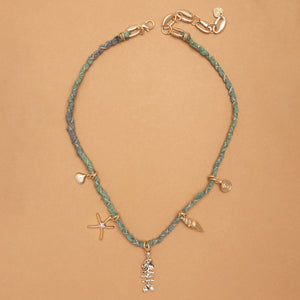 GOLDEN SEA CHARM TEAL BEADED NECKLACE