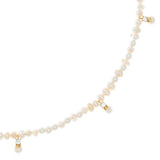 WHITE PEARL STRING CHARM NECKLACE