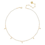 WHITE PEARL STRING CHARM NECKLACE