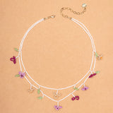 WHITE AND FUCHSIA BEAD BLOOM LAYER NECKLACE (PRE-ORDER TAKES 15 DAYS)