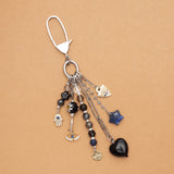 LUCKY CHARM-SAFE IN HER STRENGHT KEYCHAIN