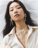WHITE PEARL BOW STATEMENT EARRINGS