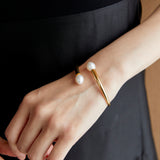 ELONGATED WHITE PEARL GOLD BANGLE