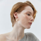 V-SHAPED WHITE PEARL STATEMENT EARRINGS