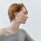 V-SHAPED WHITE PEARL STATEMENT EARRINGS