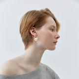 V-SHAPED WHITE PEARL STATEMENT EARRINGS