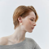 V-SHAPED WHITE PEARL STATEMENT EARRINGS