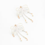 WHITE PEARL BOW STATEMENT EARRINGS