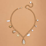 SANDY SHELL CHARM NECKLACE