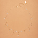WHITE PEARL SWIRL CHARM NECKLACE