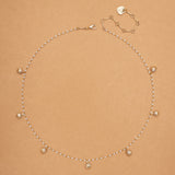 WHITE PEARL GOLD CHARM NECKLACE