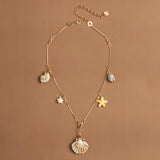 CREAM SHELL CHARM NECKLACE