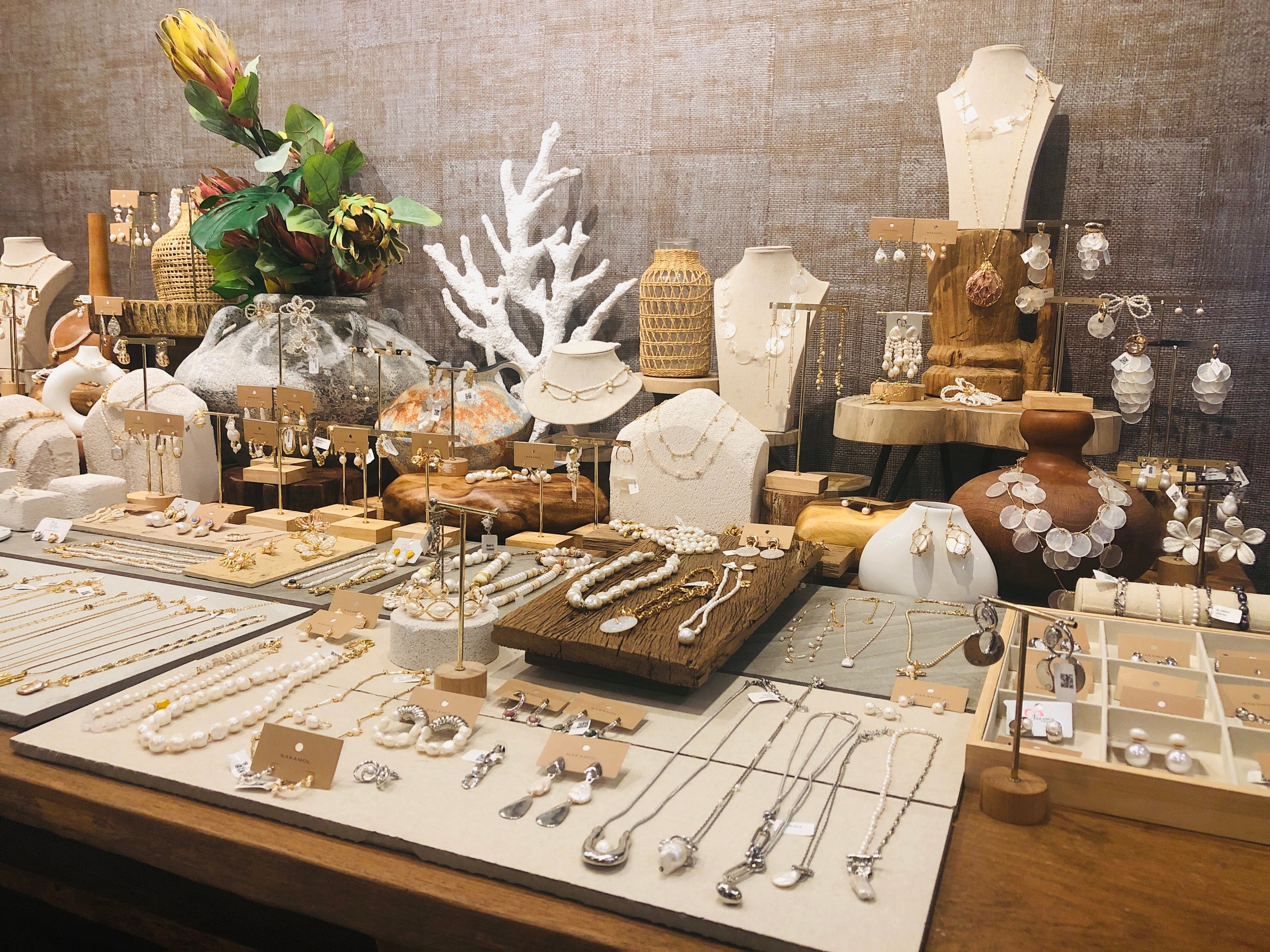 Nakamol Thailand wholesale jewelry display with pearls shells and natural materials