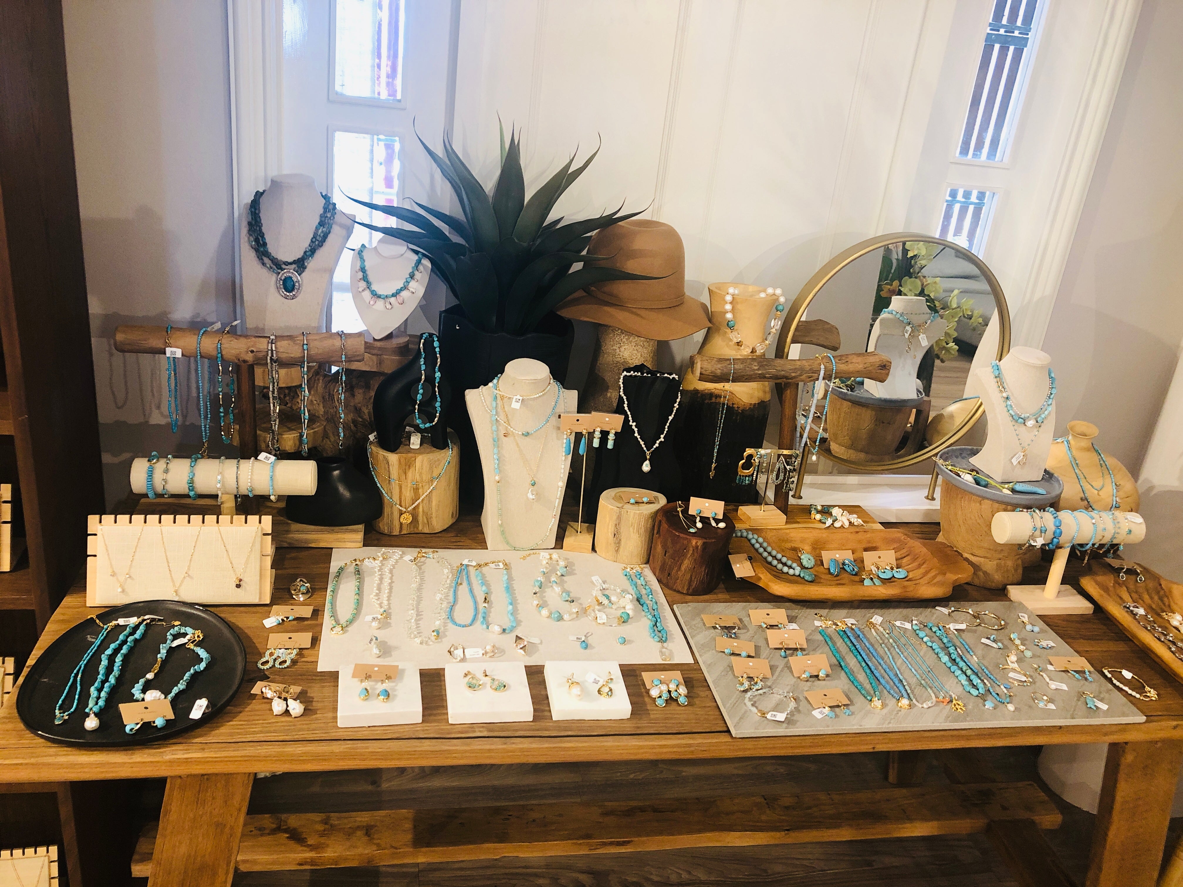 Nakamol wholesale showroom display with blue stones pearls and resort jewelry