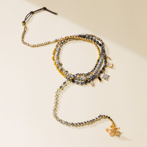 LONG CHARM CRYSTAL NECKLACE