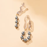 TWIST SILVER PEARL EARRINGS